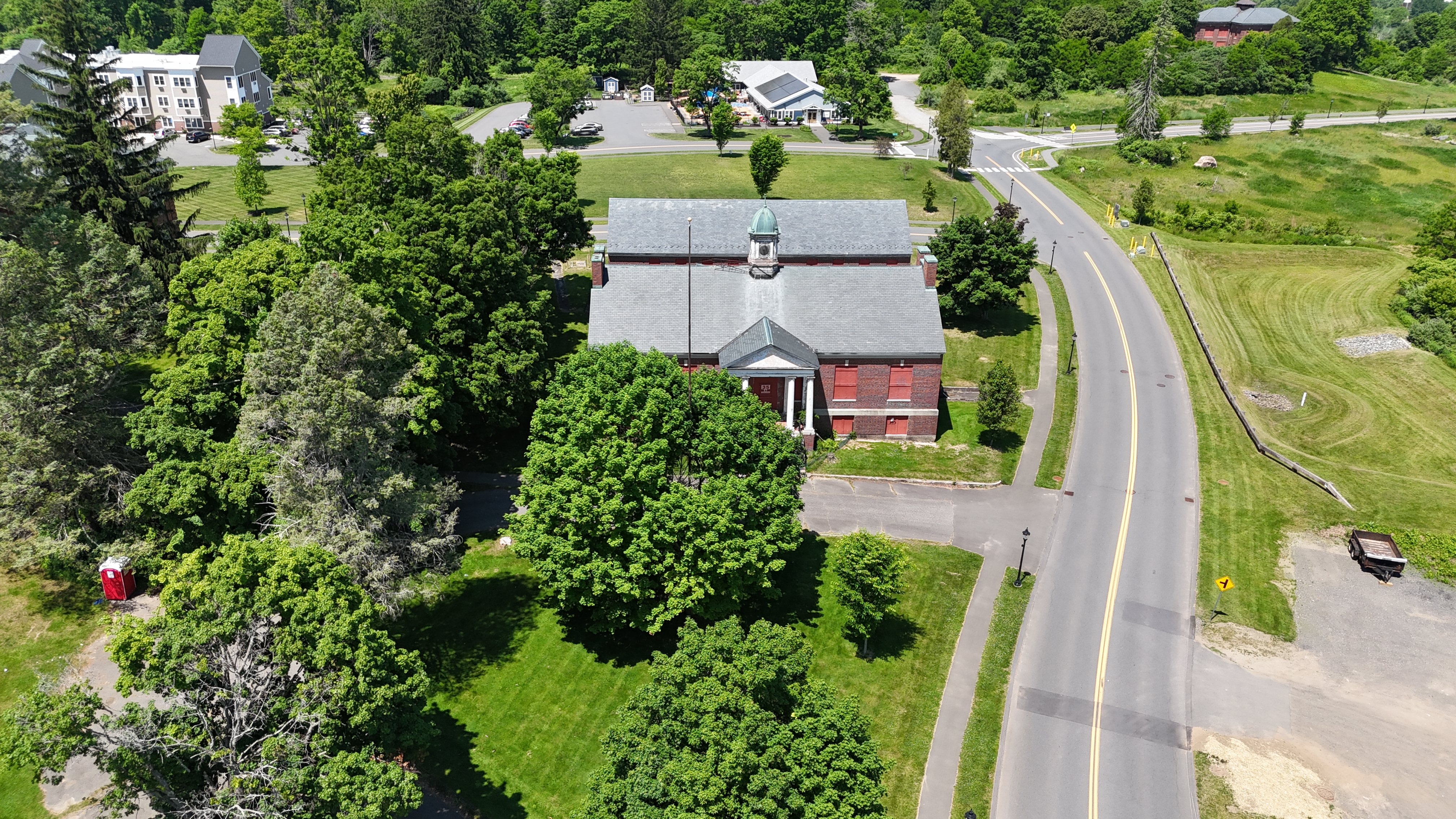 https://www.massdevelopment.com/assets/portfolio/available-properties/Carriage_Grove_Administration_20260605.jpg