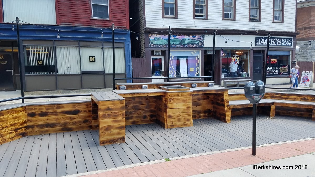 This manufactured mobile pocket park offers plenty of seating to enjoy takeout from one of the local eateries on Eagle Street.